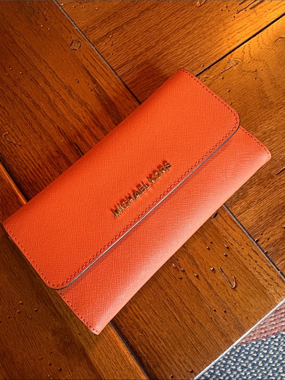 Michael Kors Orange Saffiano Folded Wallet with Gold Logo